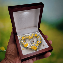 Heart Necklace and Baby Feet -Yellow Roses Background Design
