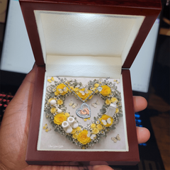 Heart Necklace and Baby Feet -Yellow Roses Background Design